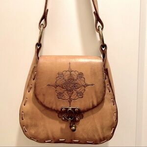Hand-stitched, sturdy, leather shoulder bag